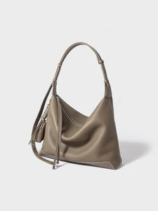 Sac bandoulière unisexe en cuir véritable avec fermeture éclair, grande capacité, imperméable et au design tendance - Product Image 4