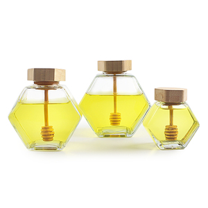 100ml 230ml 380ml <span class=keywords><strong>300g</strong></span> 500g pot <span class=keywords><strong>de</strong></span> miel d'abeille en verre en forme hexagonale <span class=keywords><strong>de</strong></span> luxe avec couvercle en <span class=keywords><strong>bois</strong></span> <span class=keywords><strong>de</strong></span> bambou - Product Image 1