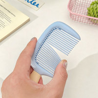 Mini peigne à cheveux en forme de crème glacée, brosse à cheveux portable antistatique en plastique pour les voyages et l'usage quotidien