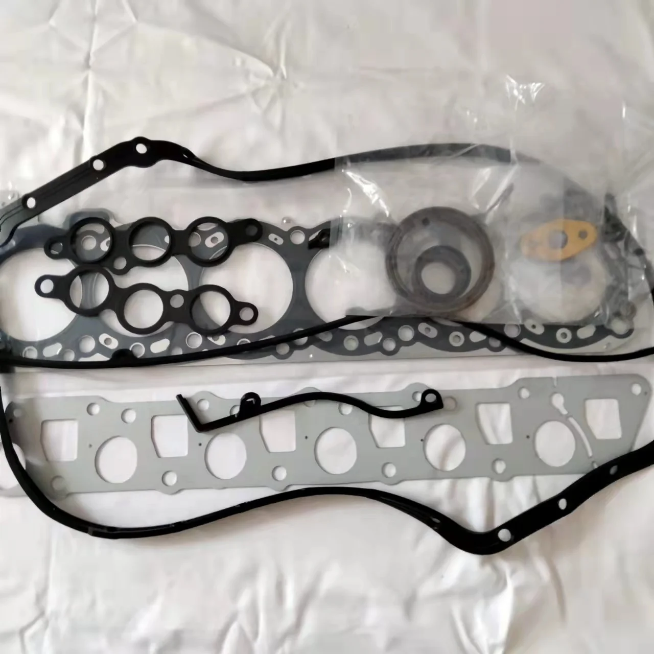 日産用rd28エンジンガスケットキットrd28シリンダーヘッド