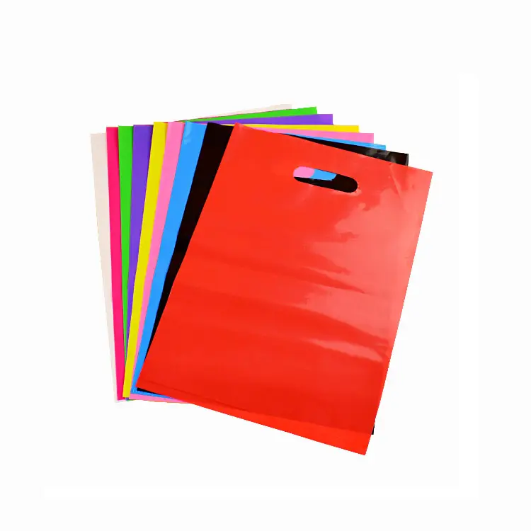 حقائب تسوق بلاستيكية وردية مع مقابض