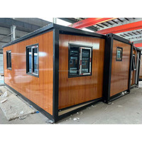 Maison conteneur à panneaux sandwich extensibles à double aile, pod de glamping mobile avec confort hôtelier et design contemporain