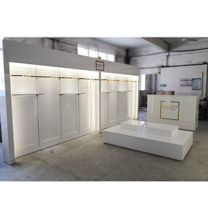 Customized <strong>Wall</strong> <strong>Mounted</strong> <strong>Clothes</strong> Rack Stainless Steel <strong>Clothes</strong> <strong>Hanging</strong> Rack for Garments Showroom Display - Product Image 1