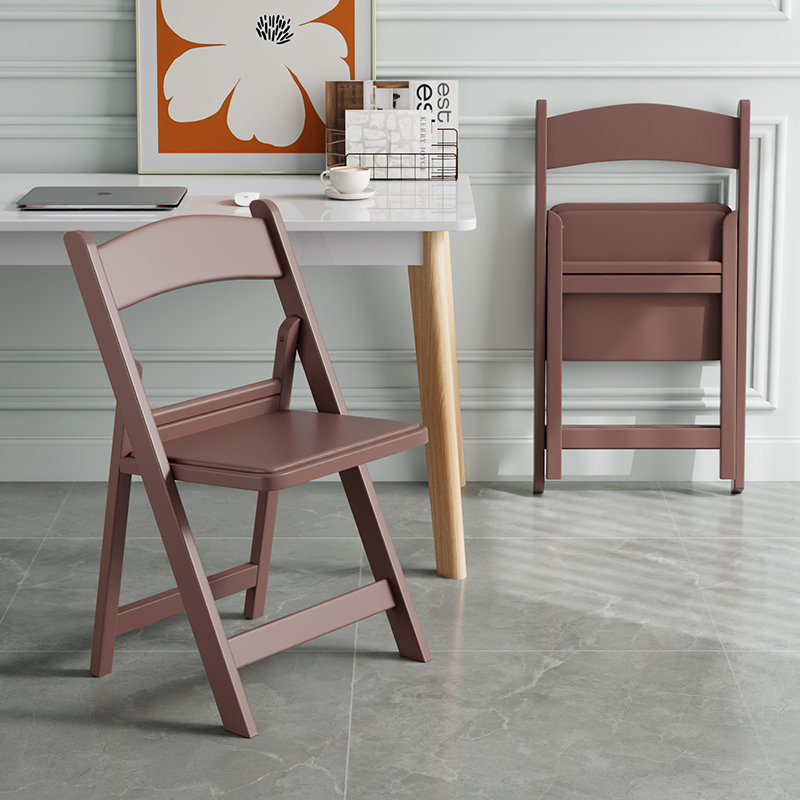 Brown upholstered folding chair with reinforced seat