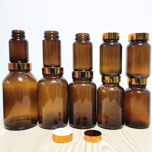 60ml 70ml 100ml 120ml 150ml 200ml 250ml 300ml bottiglia rotonda in vetro ambra marrone capsula a bocca larga con coperchio in oro - Product Image 1