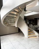 Conception d'escalier incurvé d'intérieur de villa avec l'étape de marbre du fournisseur d'escaliers de Foshan