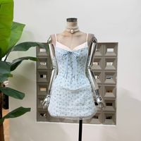 Nouvelle Collection Été Vêtements Femme : Ensemble Deux Pièces Haut Bustier à Nœud Floral et Jupe à Motif Arête de Poisson
