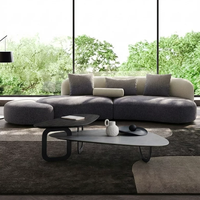 Canapé modulable minimaliste italien, conçu pour les salons de toutes tailles, avec un tissu en forme d'arc et à motif ciel étoilé dégradé