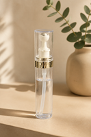 Flacon roll-on PETG 20 ml transparent pour sérum cosmétique avec col doré et tête de pression blanche