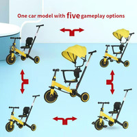 Poussette multifonctionnelle cinq en un, tricycle, vélo, design pliable, pour enfants, avec système de pédales léger et portable