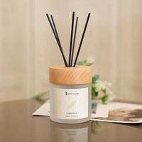 100ml 150ml Vente en gros de marque privée Diffuseur de roseaux de couleur givrée Couvercle en bambou Aroma Bouteille de diffuseur de roseaux de luxe