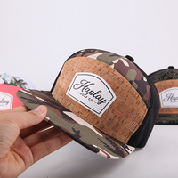 Casquette de golf structurée à 7 panneaux et visière plate, personnalisée, haut de gamme, en tissu sport respirant perforé découpé au laser, imprimé camouflage, pour la vente en gros