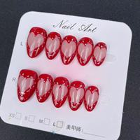 Ongles artificiels forme d'amande peints à la main coeur rouge presse réutilisable de haute qualité sur les ongles en gros