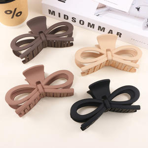 Pince à cheveux géométrique en plastique couleur unie simple avec nœud papillon pour femme, grande taille - Product Image 1