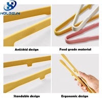 Pince de cuisine multifonctionnelle en silicone résistante à la chaleur avec poignée tridimensionnelle, personnalisable avec logo, en promotion