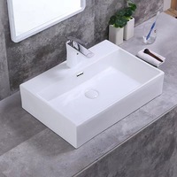 Lavabo de comptoir en céramique blanche de style nordique moderne haut de gamme avec une capacité de 12 L pour salle de bain