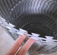 Fil de sécurité concertina haute résistance galvanisé à lames barbelées anti-coupure pour clôtures de frontières, centrales électriques et prisons