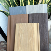 Panneaux de bardage mural en WPC résistant aux UV, revêtement mural en composite bois pour la décoration extérieure des maisons