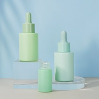 Flacon de sérum pour les yeux à l'huile essentielle pour soins cosmétiques, en verre dépoli à épaule plate, 30 ml, vert mat, sérigraphie