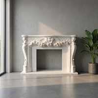 Cheminée en marbre blanc de style rococo français, sculptée à la main avec des motifs de roses, pour la décoration de villas et de maisons.