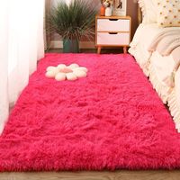 Vente en gros de tapis moderne en polyester rose moelleux avec cheveux super longs fabriqués à la machine, de couleur unie et hirsute, pour le salon de l'enfant