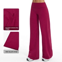 Ensemble de yoga TikTok Viral respirant à séchage rapide en tissu brossé uni, chemises d'entraînement pour femmes, pantalons de yoga à jambes larges en nylon et élasthanne, ensembles de sport