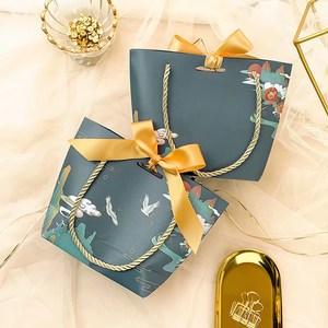 Faveur de mariage en papier <span class=keywords><strong>vert</strong></span> imprimé coloré personnalisé <span class=keywords><strong>sac</strong></span> à main bonbons transporter des sacs d'emballage petit mignon porte <span class=keywords><strong>sac</strong></span> cadeau avec ruban - Product Image 4