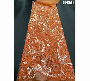 Supoo Luxury orange bridal beads lace net fabrics with shiny sequins for European style dress