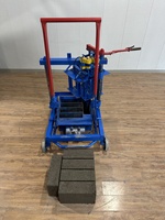 Ligne de production multifonctionnelle semi-automatique de briques creuses simples Machine à blocs de béton africaine populaire