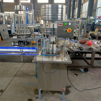 Machine de remplissage semi-automatique, 12 têtes, pour remplir l'eau vin/liqueur par gravité, petite entreprise, nouveauté
