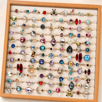 Bagues décoratives XUPING pour femmes, 120 pièces, formes multiples, cristaux, designs aléatoires, plaqué or 14 carats, vente en gros, cadeau