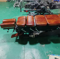 Table de chiropratique fixe pour la rééducation, destinée aux chiropraticiens