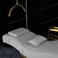 Nouveau lit à cils incurvé pour salon de beauté Lit de massage à base dorée Lit à cils