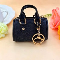 Nouveau mini sac de luxe Sunrise, porte-monnaie de créateur, porte-clés en cuir PU, forme ovale, écologique, haute qualité, portable, logo personnalisé