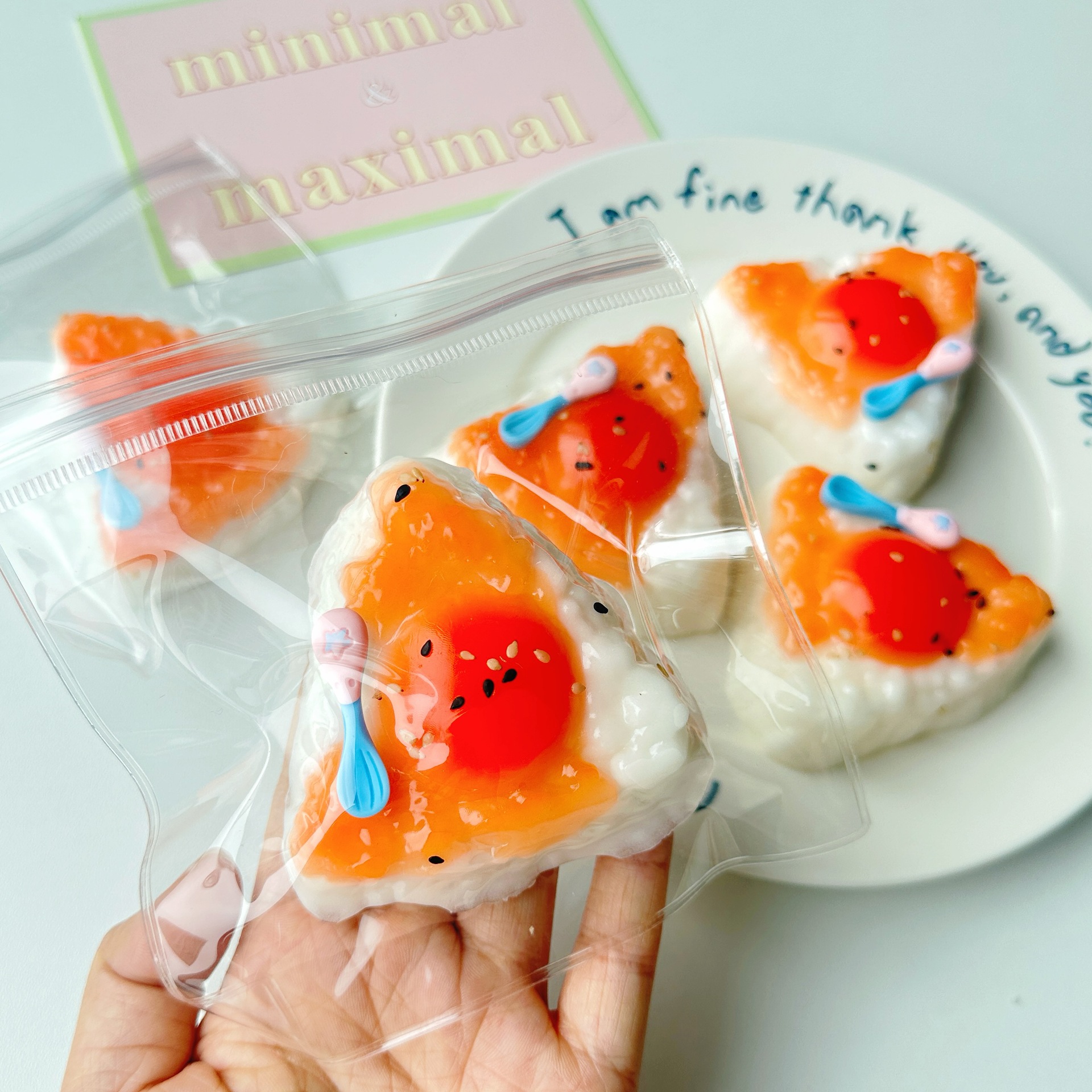 Rice balls with egg yolk triangle