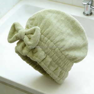 หมวกคลุมผมแห้งแบบขายส่ง OEM น่ารักสไตล<span class=keywords><strong>์เกาหลี</strong></span> ผ้าฟลานเนล ผ้าคอรัลฟลีซ ผ้าขนหนูพันผม หมวกอาบน้ำสำหรับผู้หญิง ที่คาดผมอาบน้ำ - Product Image 6