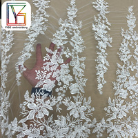Nouveau Design mariée broderie florale perlée Tulle dentelle tissu français de haute qualité blanc paillettes maille dentelle tissu pour robe de mariée