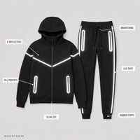 Ensemble de survêtement 2 pièces pour homme avec bande réfléchissante, veste à capuche entièrement zippée en polaire thermocollée et pantalon de jogging avec poches zippées, fabrication sur mesure pour le sport