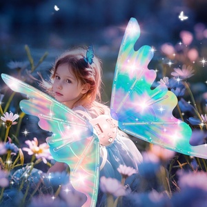 sachin and babi light blue dress Fairy tale concept. Cute Little blonde girl wearing beautiful princess dress  with fairy wings isolated on white background Stock Photo