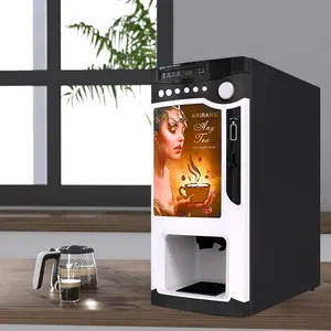 ماكينة بيع وتحضير قهوة فورية تجارية تعمل بالعملة المعدنية توضع على الطاولة ومن ثم تتحول إلى فنجان من حبوب القهوة