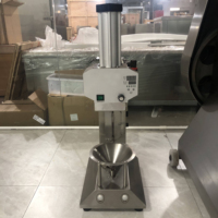 Machine à peler les noix de coco automatique commerciale à succès avec fonction anti-perforation, haute efficacité, rapide et sûre pour l'élimination de la peau de noix de coco HJ-CAX5