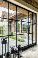 Portes françaises en acier à double battant Fenêtres en verre fixes insonorisées en fer pour cloison d'entrée de maison