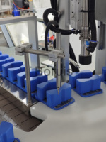 Machine automatique de sertissage et de collogation de capuchons de parfum à commande PLC