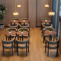 Ensemble de mobilier de bistro en gros, table ronde 2 places, chaises avec accoudoirs en cuir, adapté aux pizzerias, cafés et restaurants