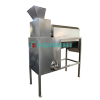 Machine de séparation de la pulpe, des pépins et des peaux de jus de fruit de la passion