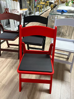 Chaise de salle à manger pliable en résine plastique, capacité de charge élevée, empilable et portable pour la location d'hôtels et de salles de réception