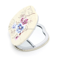 Cadeaux promotionnels publicitaires en cuir PU personnalisables - Miroirs cosmétiques pliables à motifs de dessins animés avec des fonctionnalités personnalisées