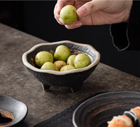 Assiettes plates japonaises uniques et modernes en argile noire pour servir, idéales pour les desserts, les sushis, les plats de restaurant