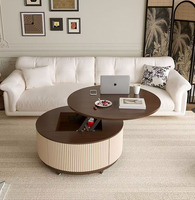 Table basse ronde élégante avec côtés cannelés, mécanisme de levage et rangement intégré