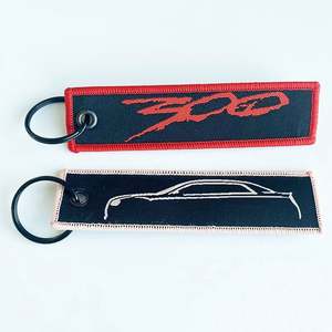 High Quality Custom Double Side Embroidery or Woven Fabric Keychain Keytag Keyring - Product Image 1